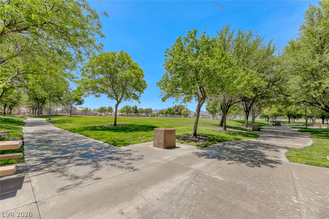 2001 Appaloosa Road Henderson, NV 89002 - Photo 15 of 44 Lush green space offers serene park views with inviting pathways.