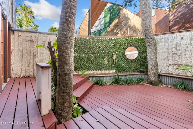 an aerial view of house with yard swimming pool and outdoor seating