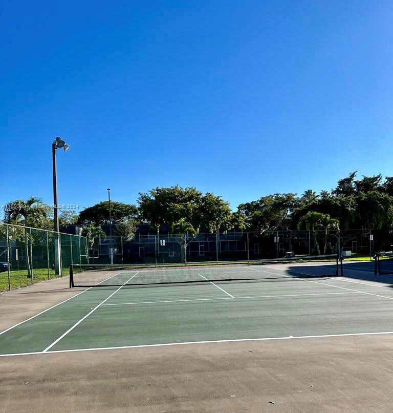 721 North Pine Island Road, Unit 213 Plantation, FL 33324 - Photo 7 of 11 a view of a tennis court