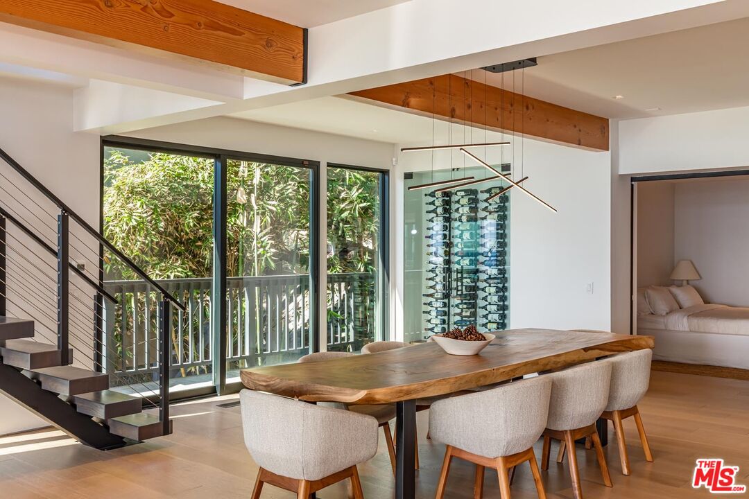 24548 Malibu Road Malibu, CA 90265 - Photo 6 of 28 a view of a dining room with furniture window and outside view