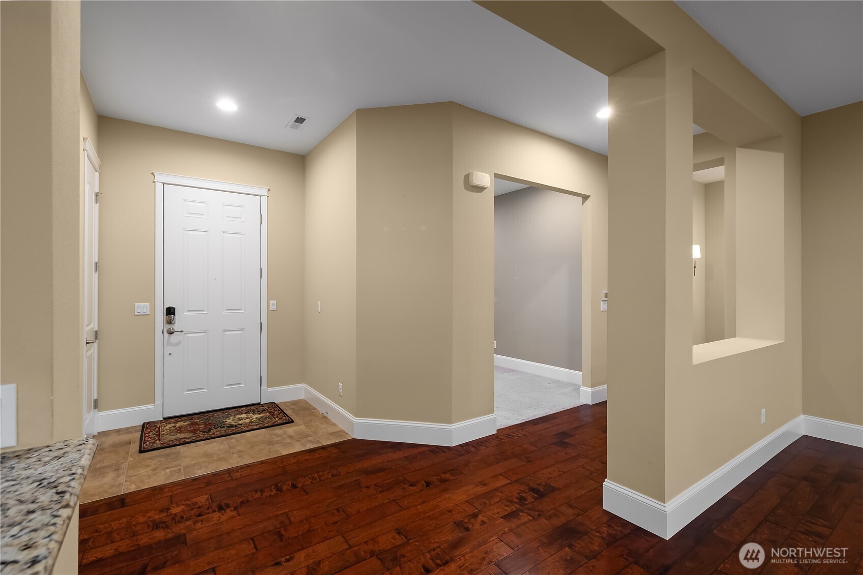 8265 Orcas Loop Northeast Lacey, WA 98516 - Photo 32 of 39 a view of a room with wooden floor and bathroom