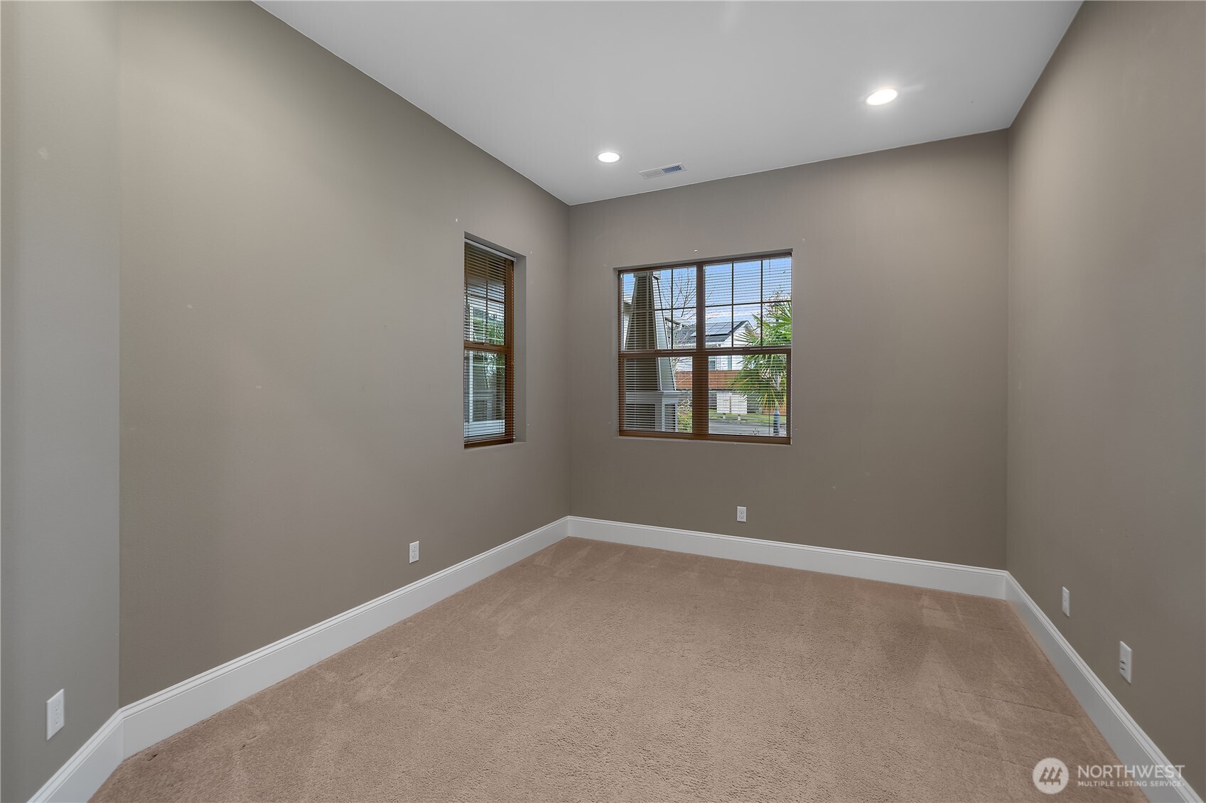 8265 Orcas Loop Northeast Lacey, WA 98516 - Photo 33 of 39 an empty room with windows
