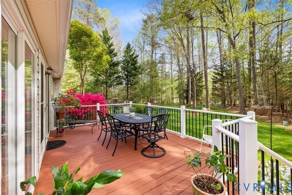 a view of a house with a yard porch and sitting area
