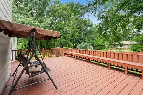a view of deck with a flat screen tv