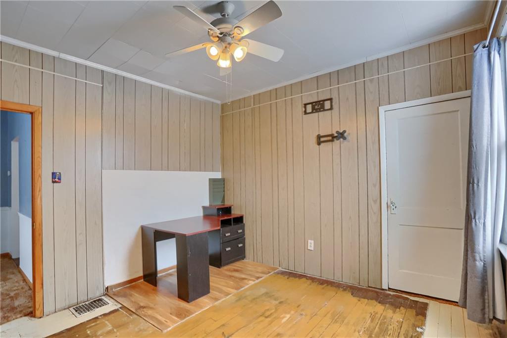 314 13th Street Bessemer, PA 16112 - Photo 16 of 26 a view of a livingroom with a chandelier