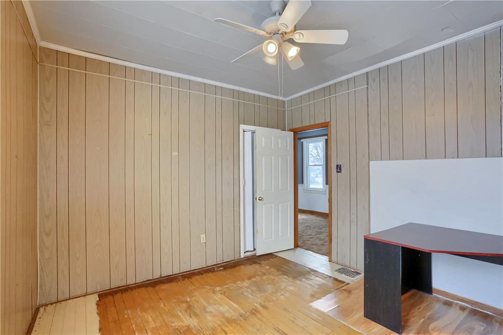 314 13th Street Bessemer, PA 16112 - Photo 17 of 26 a view of an empty room with a ceiling fan