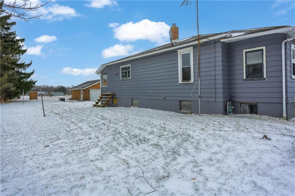 314 13th Street Bessemer, PA 16112 - Photo 4 of 26 a backyard of a house with barbeque oven table and chairs