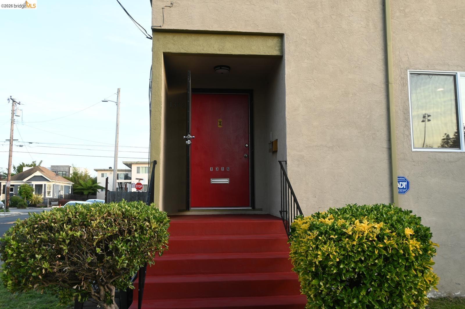 1316 Russell Street Berkeley, CA 94702 - Photo 3 of 23 a front view of a house with a yard