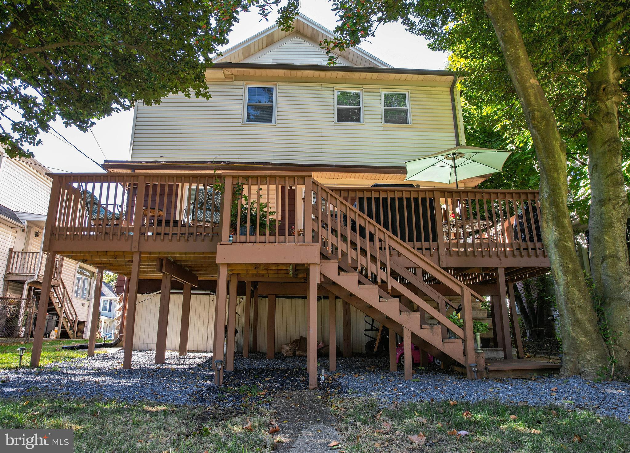 211 Mallow Hill Road Baltimore, MD 21229 - Photo 38 of 49 a front view of a house with a yard
