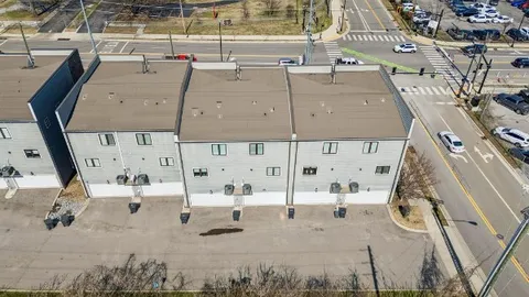 a view of a city with tall buildings