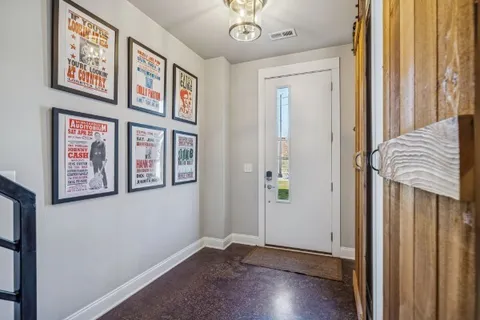 a bathroom with a shower and a sink