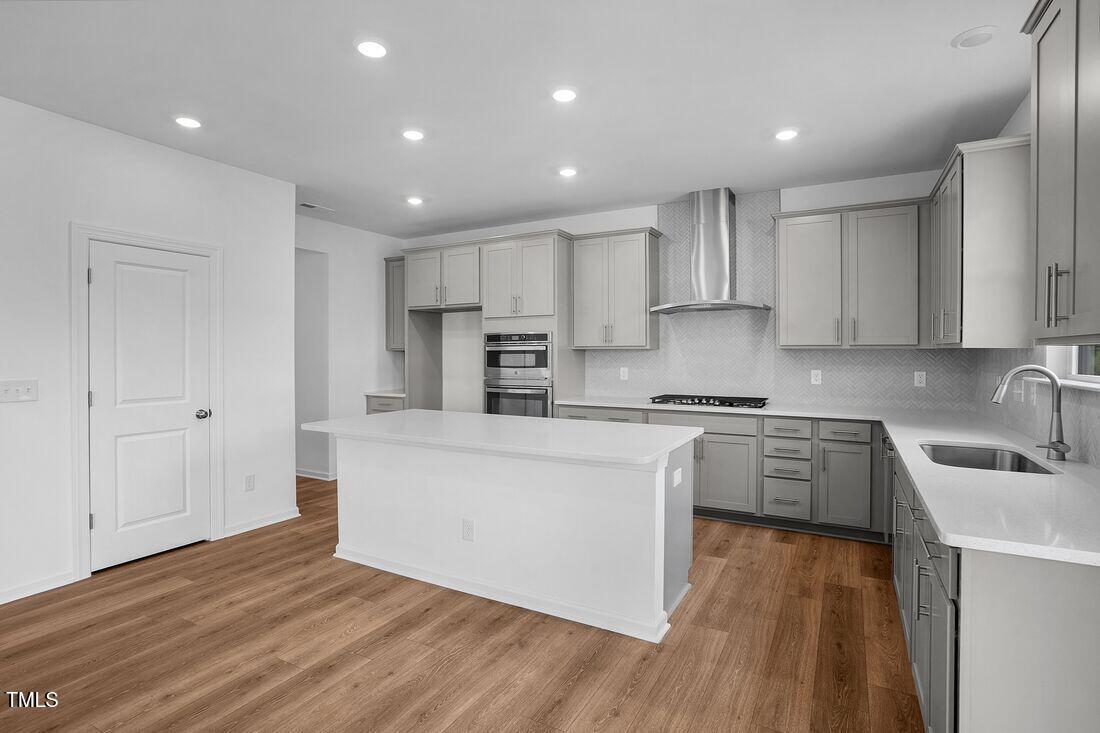 925 Kinglet House Road Knightdale, NC 27545 - Photo 2 of 36 silverstone-bedford-lot-372-kitchen