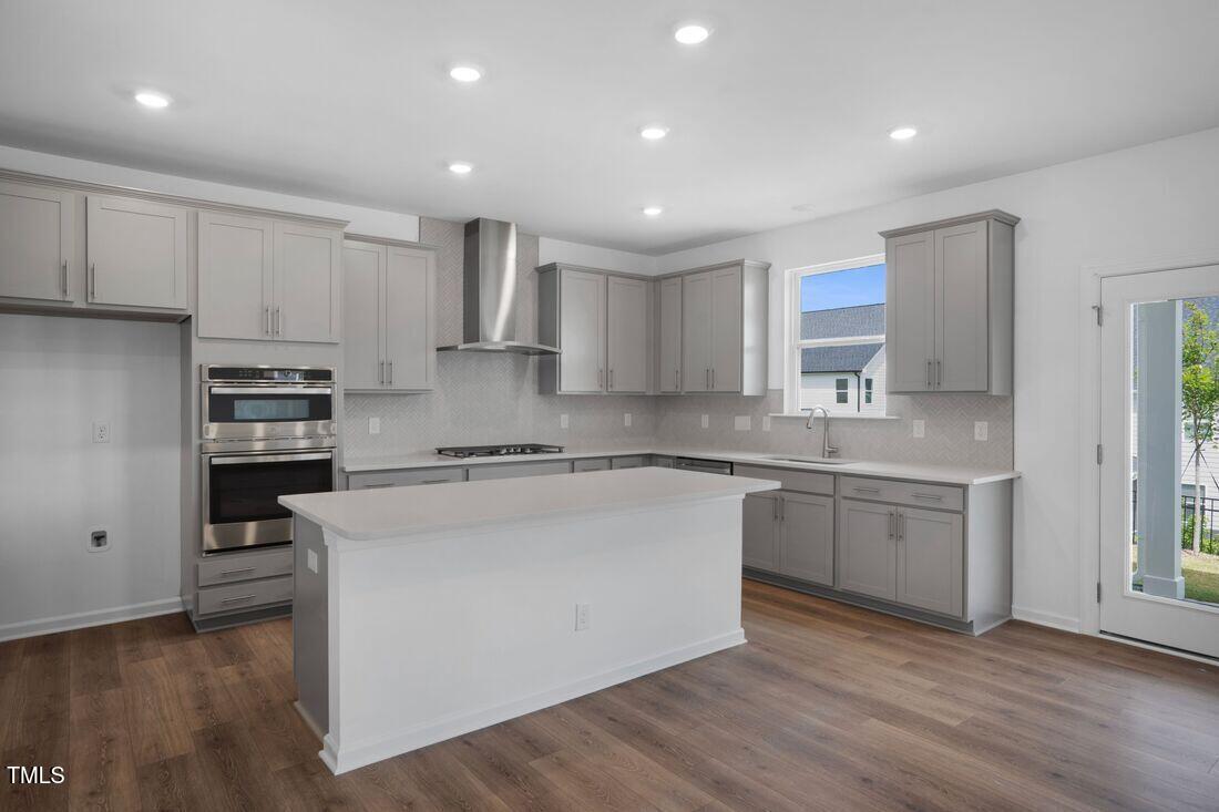 925 Kinglet House Road Knightdale, NC 27545 - Photo 4 of 36 silverstone-bedford-lot-372-kitchen