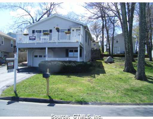 66 Fall Mountain Lake Road Plymouth, CT 06786 - Photo 1 of 1 a front view of a house with garden
