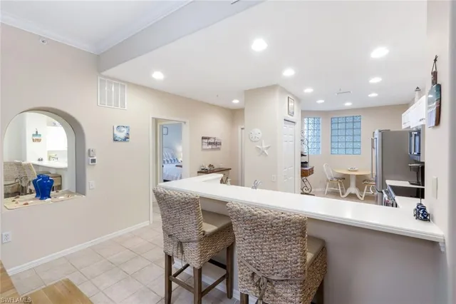 $365,000 | 8267 Parkstone Place, Unit 302, Naples, FL 34120