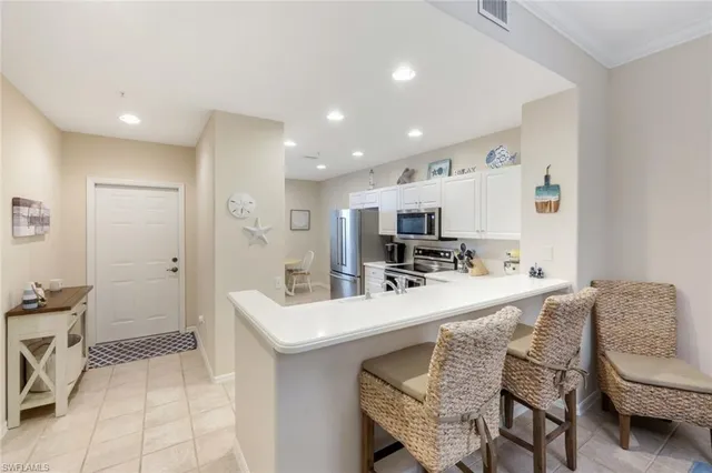 $365,000 | 8267 Parkstone Place, Unit 302, Naples, FL 34120