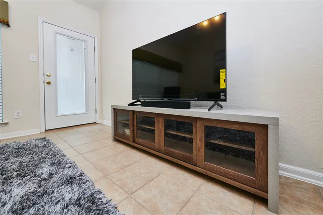 a kitchen with a stove and a microwave