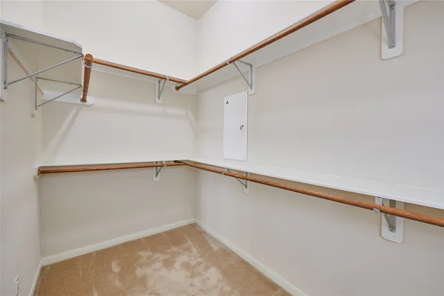 a view of a room with racks on the wall