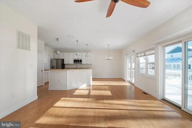 a view of living room with furniture and window