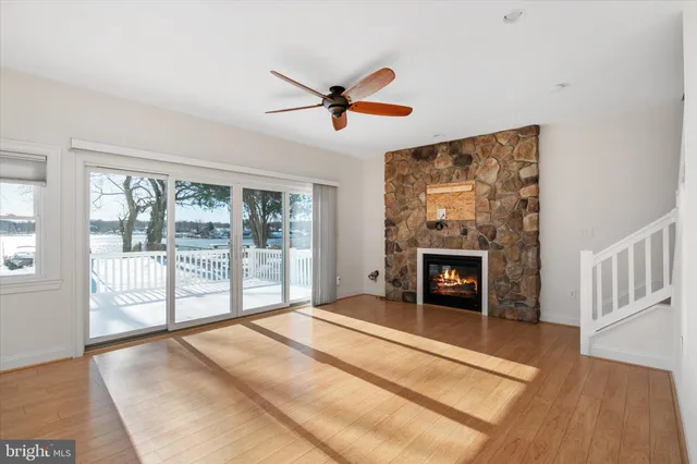 a bedroom with a bed and a fireplace