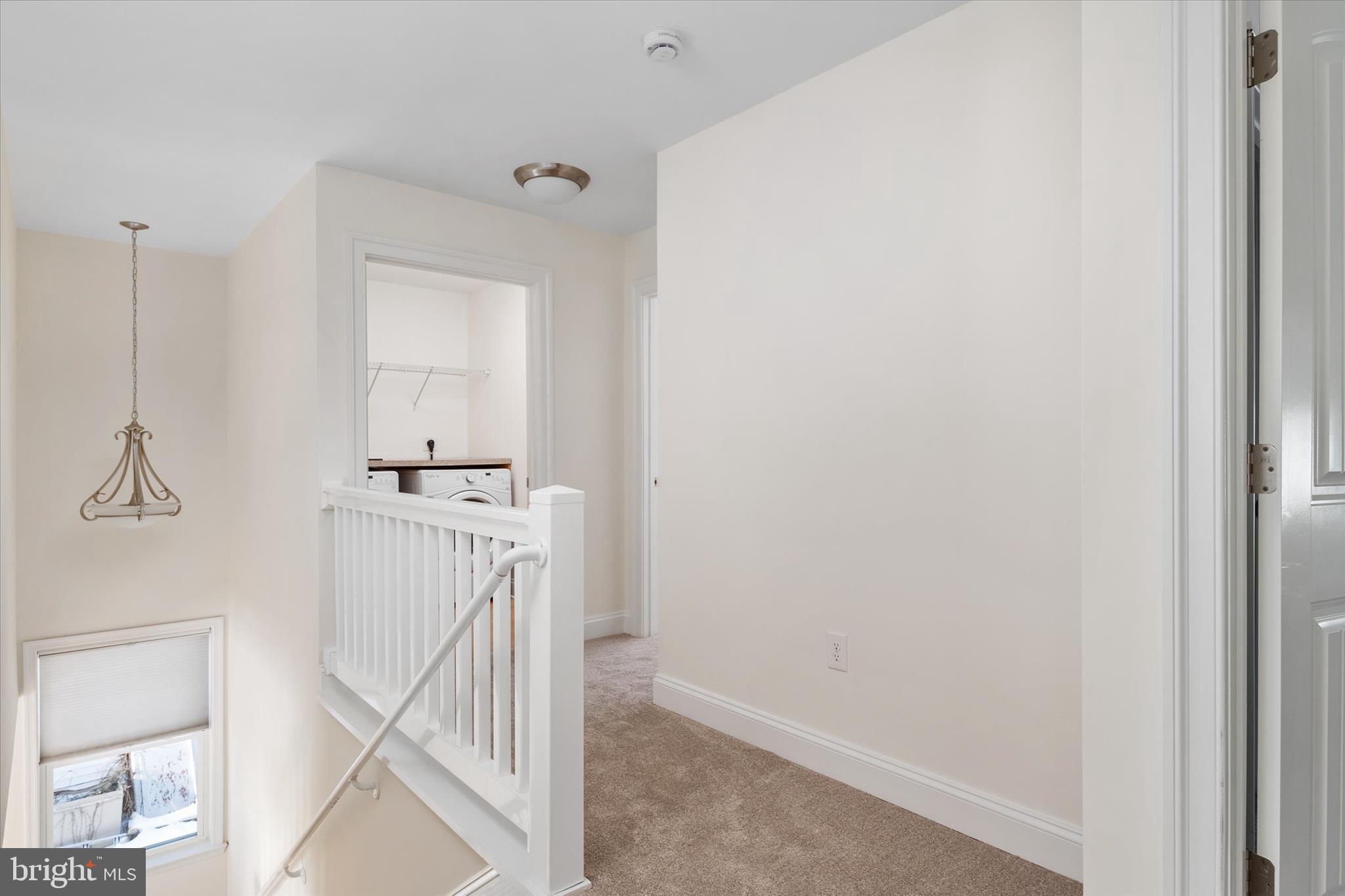 204 Bar Harbor Road Pasadena, MD 21122 - Photo 18 of 43 a utility room with cabinets washer and dryer