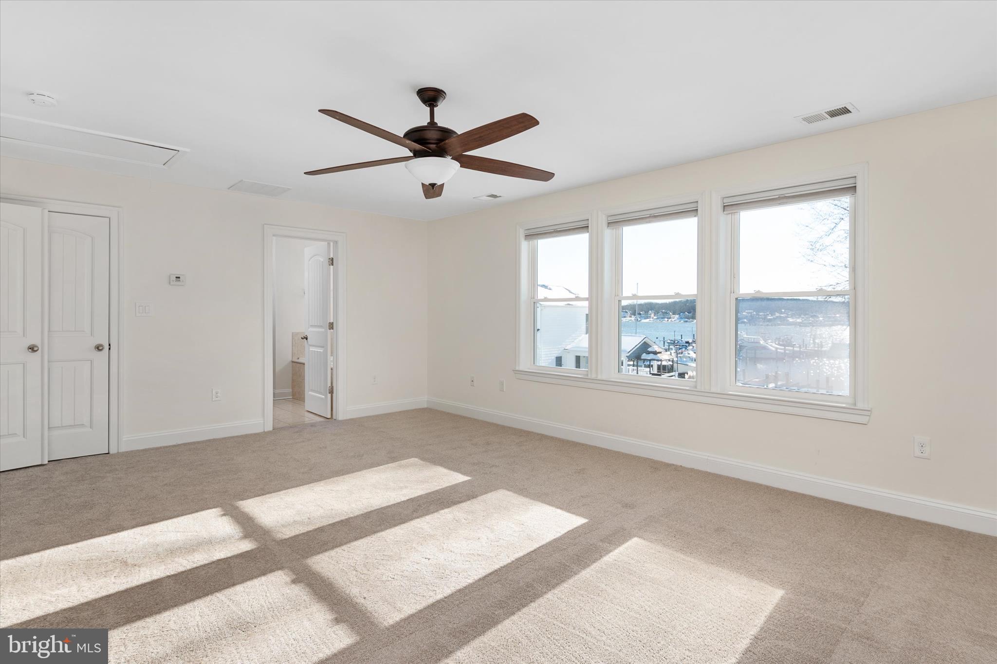 204 Bar Harbor Road Pasadena, MD 21122 - Photo 20 of 43 a view of a livingroom with a ceiling fan and window