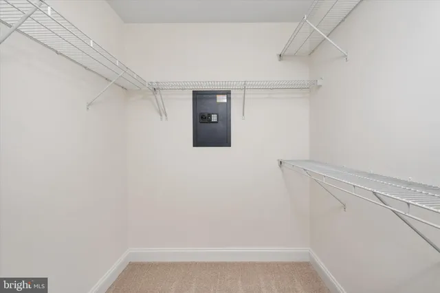 a view of an empty walk in closet