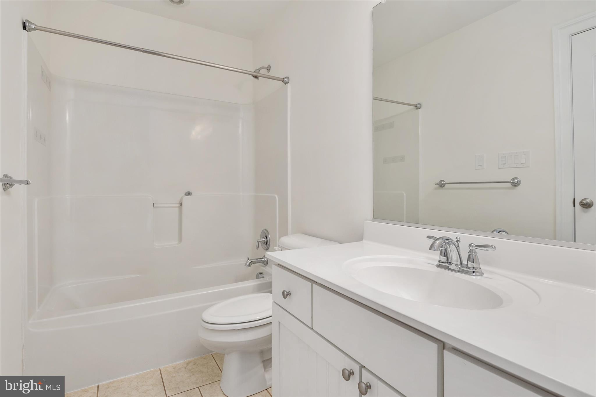 204 Bar Harbor Road Pasadena, MD 21122 - Photo 28 of 43 a bathroom with a sink a toilet and shower