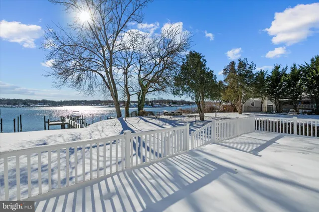 a view of roof deck with furniture