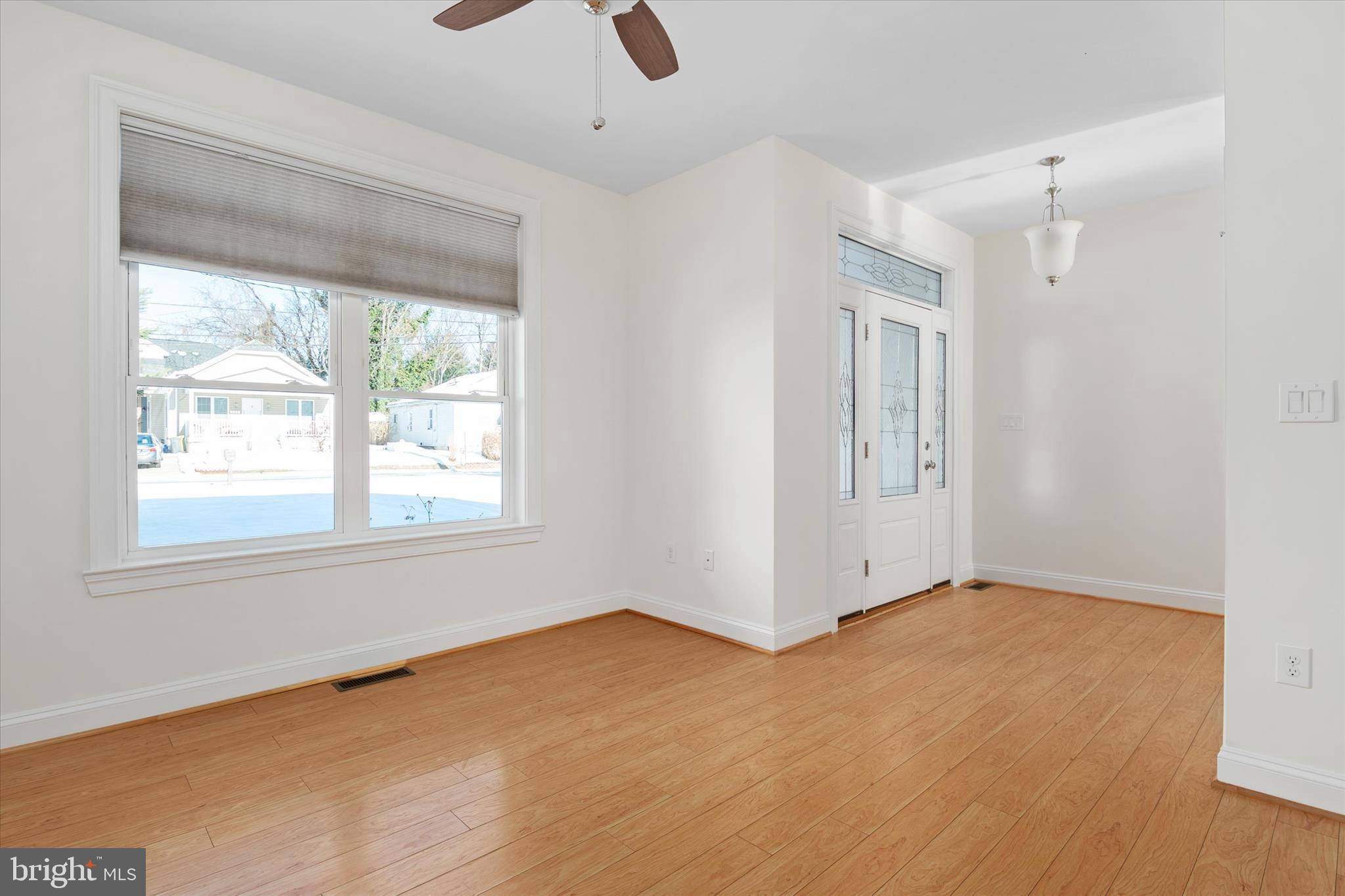 204 Bar Harbor Road Pasadena, MD 21122 - Photo 6 of 43 an empty room with windows and closet
