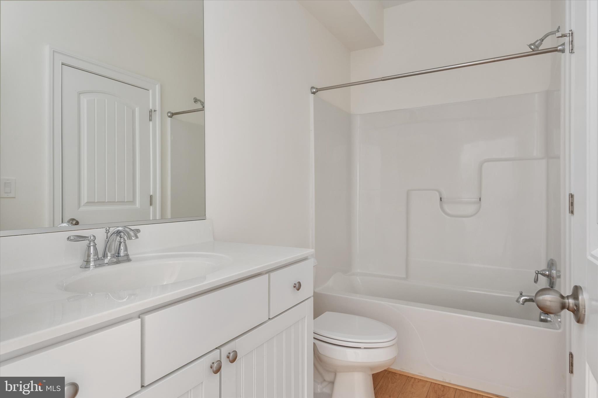 204 Bar Harbor Road Pasadena, MD 21122 - Photo 8 of 43 a bathroom with a sink toilet and shower