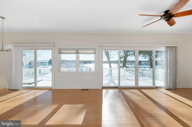 a view of a room with a large window