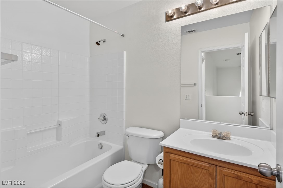 8038 Kings Ransom Street Las Vegas, NV 89139 - Photo 18 of 38 Bathroom with tub / shower combination and vanity