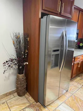 a vase of flowers sitting on a table