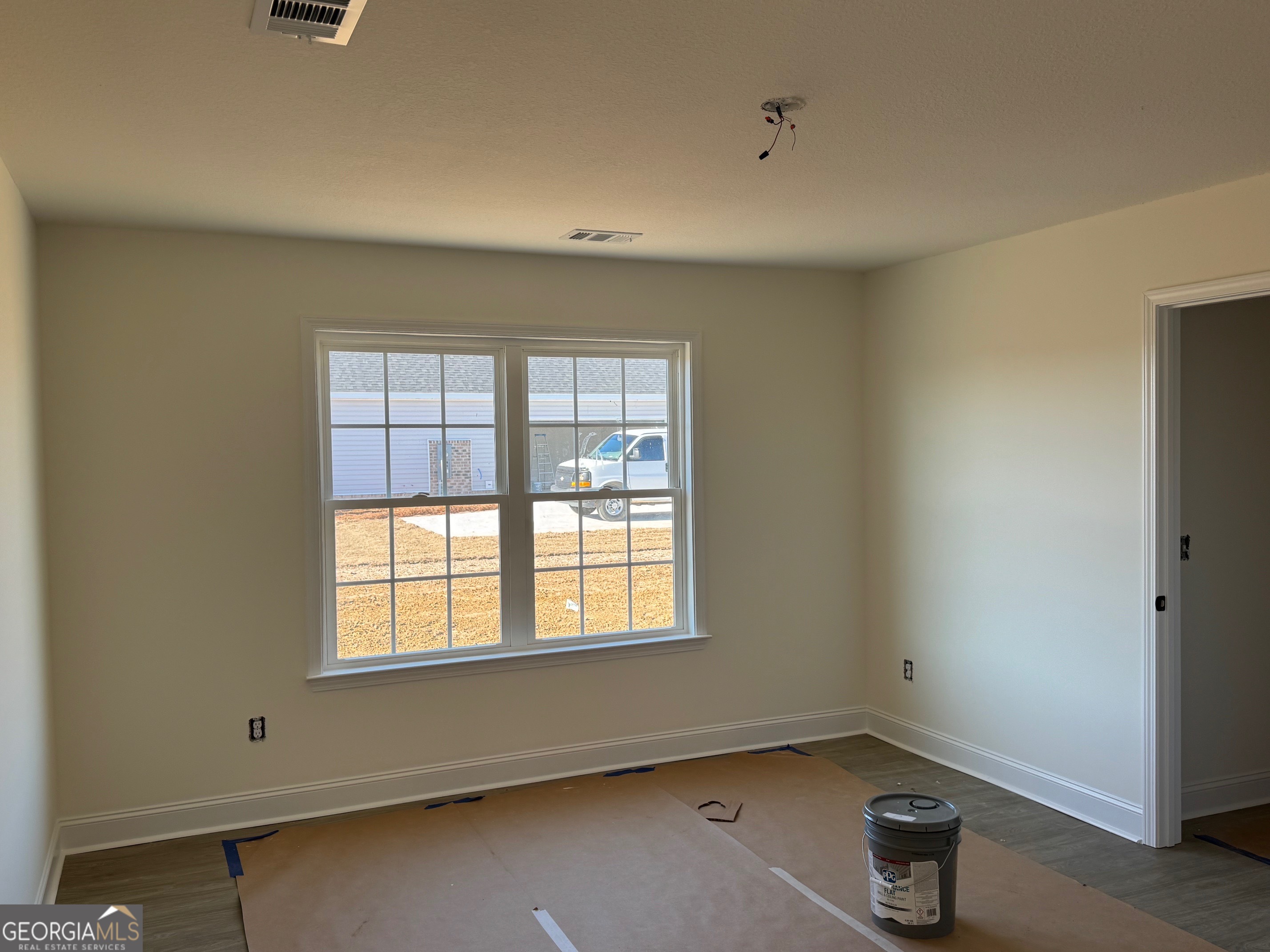 64 Pampas Road Statesboro, GA 30458 - Photo 6 of 13 an empty room with a window