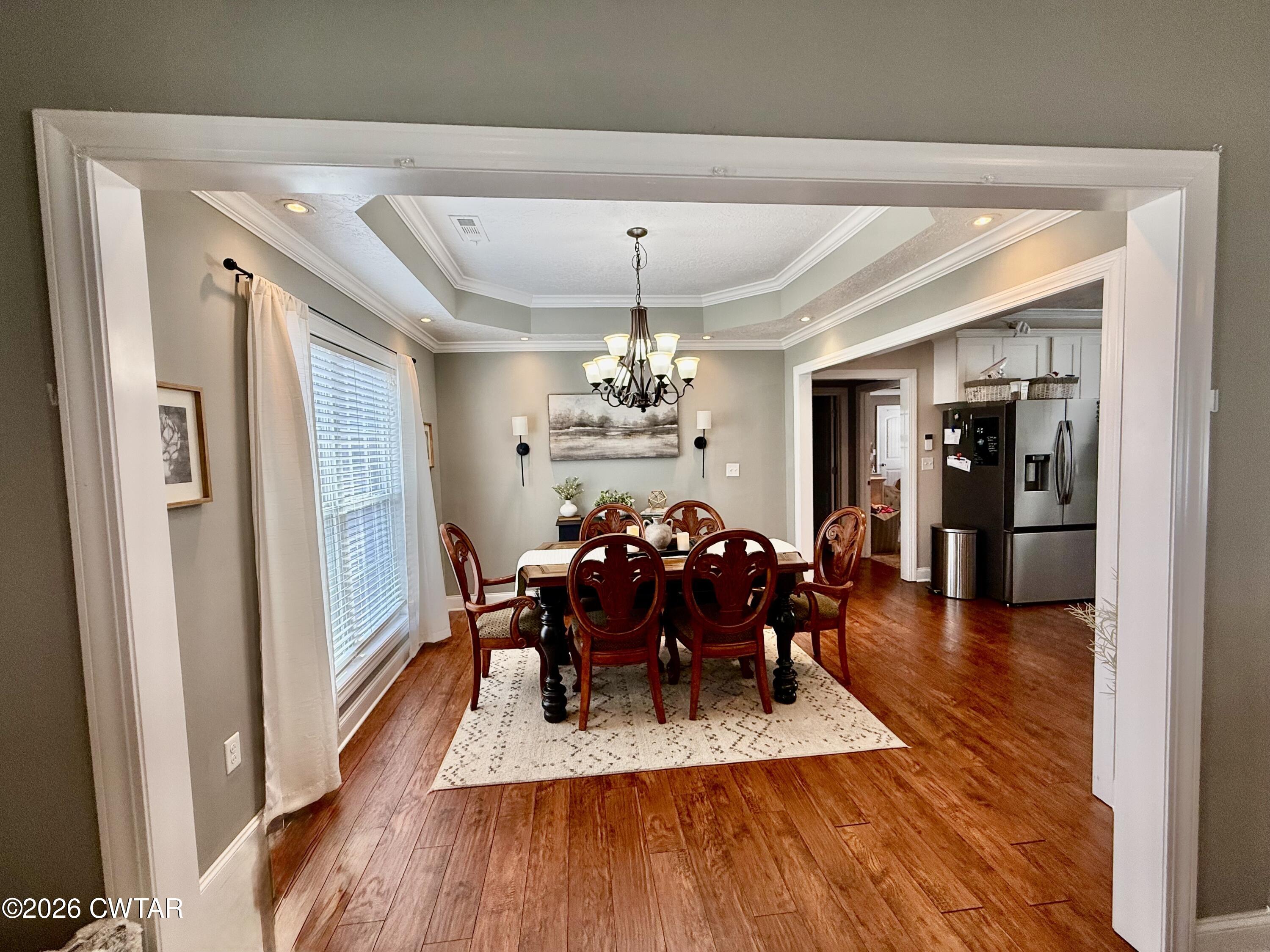 601 Locust Street Troy, TN 38260 - Photo 11 of 22 a dining room with furniture window and wooden floor
