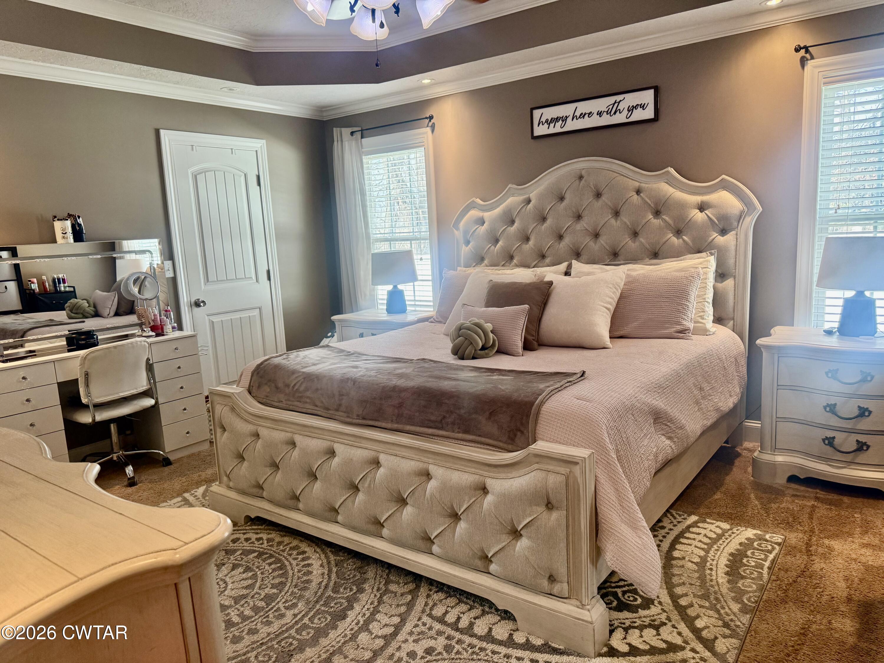 601 Locust Street Troy, TN 38260 - Photo 12 of 22 a bedroom with a bed and wooden floor