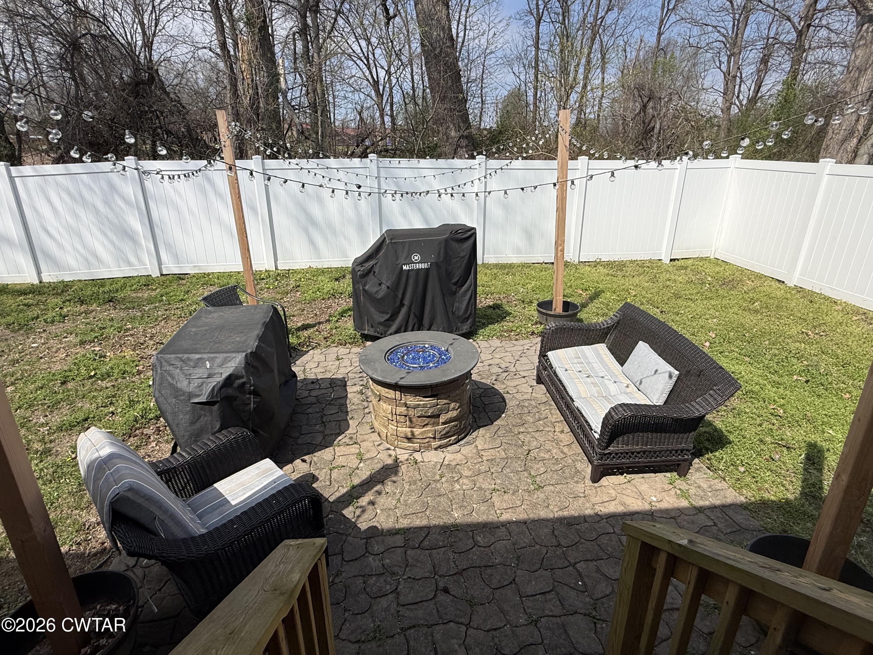 601 Locust Street Troy, TN 38260 - Photo 21 of 22 a view of a backyard with furniture