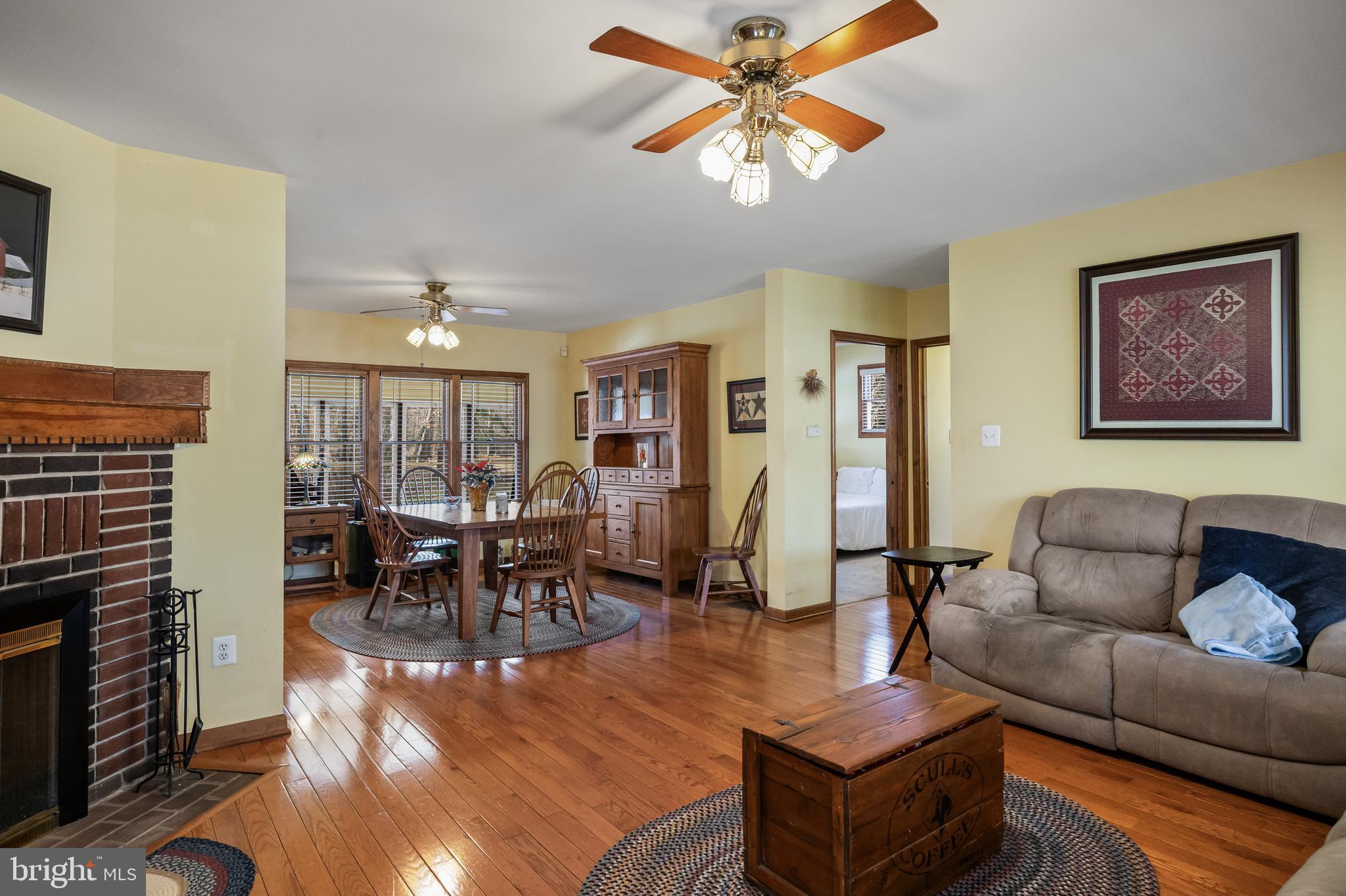 170 Birmingham Road Mount Holly, NJ 08060 - Photo 26 of 55 a living room with fireplace furniture and a wooden floor