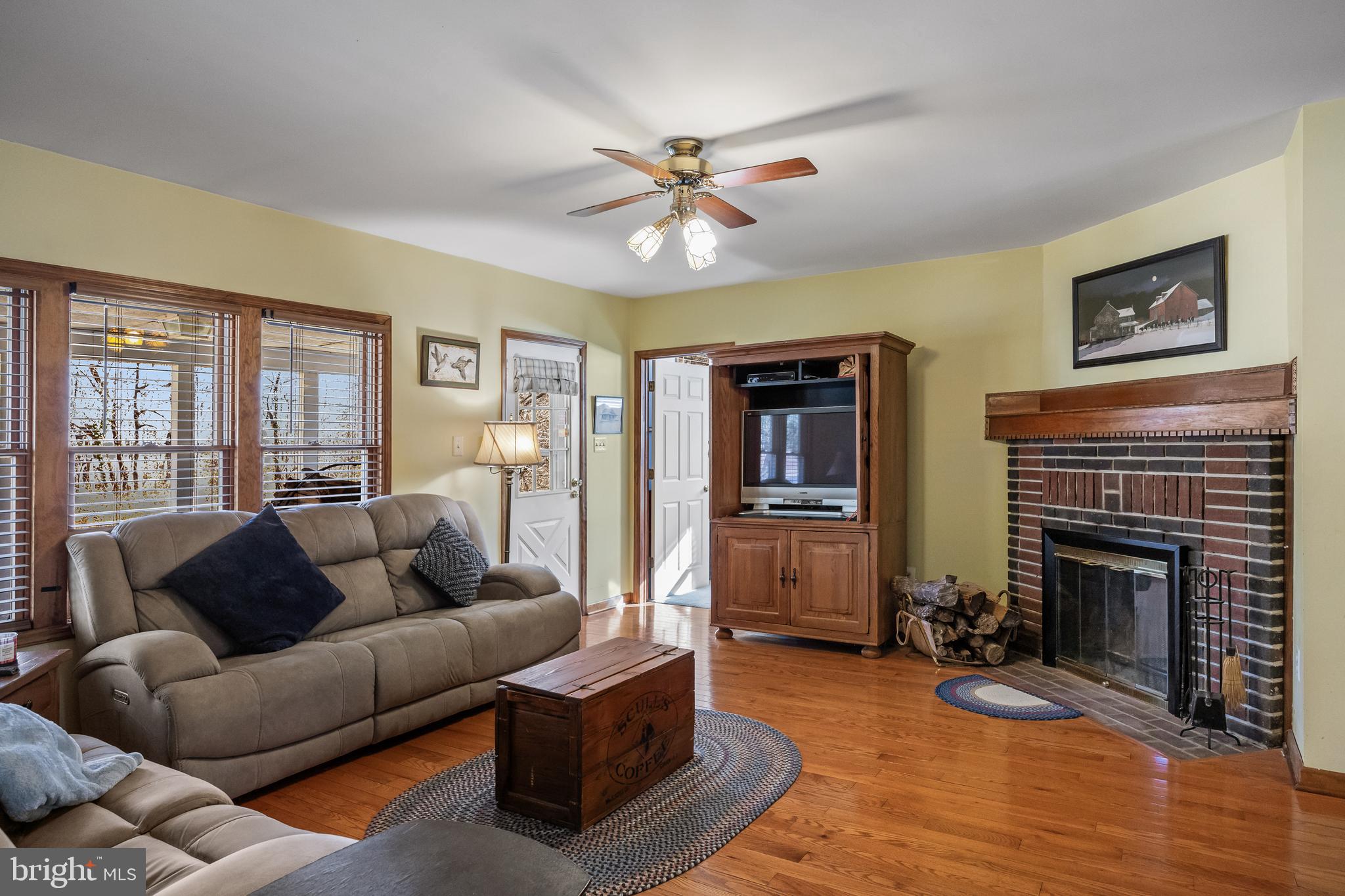 170 Birmingham Road Mount Holly, NJ 08060 - Photo 28 of 55 a living room with furniture and a fireplace
