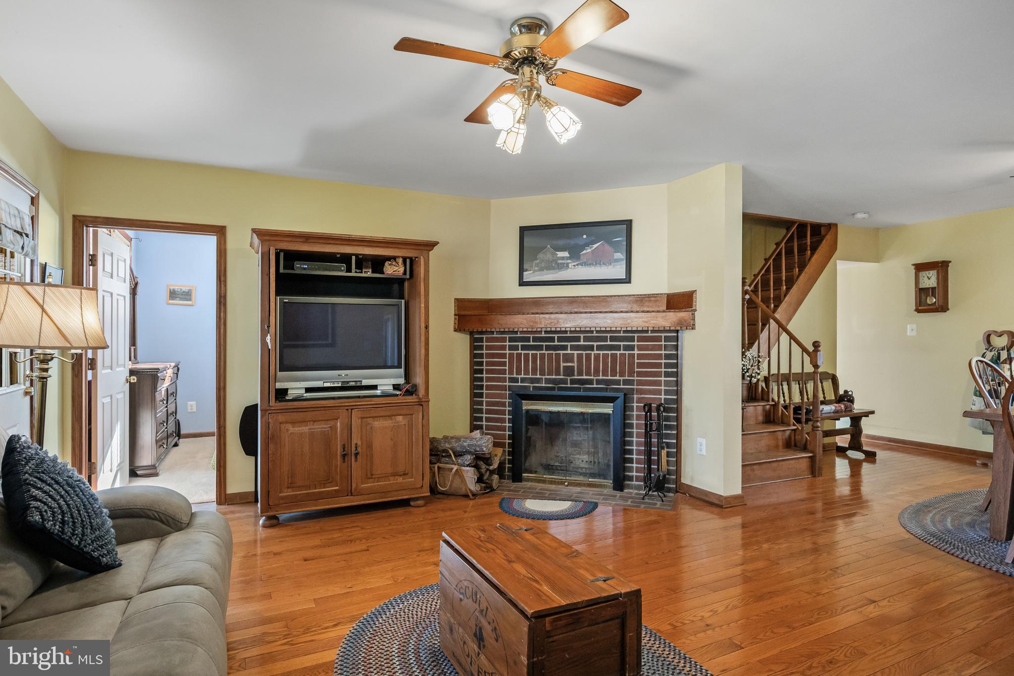 170 Birmingham Road Mount Holly, NJ 08060 - Photo 29 of 55 a living room with furniture and a fireplace
