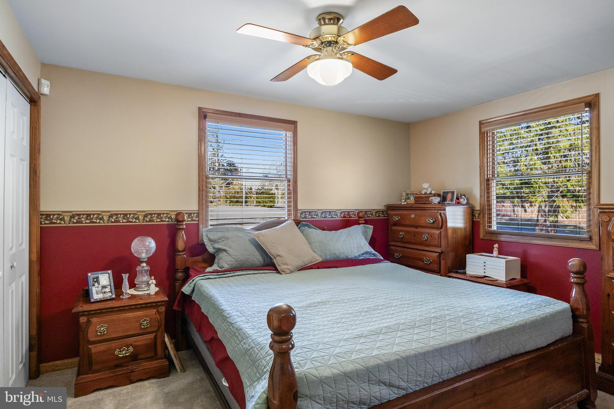 170 Birmingham Road Mount Holly, NJ 08060 - Photo 34 of 55 a bedroom with a bed and a chandelier