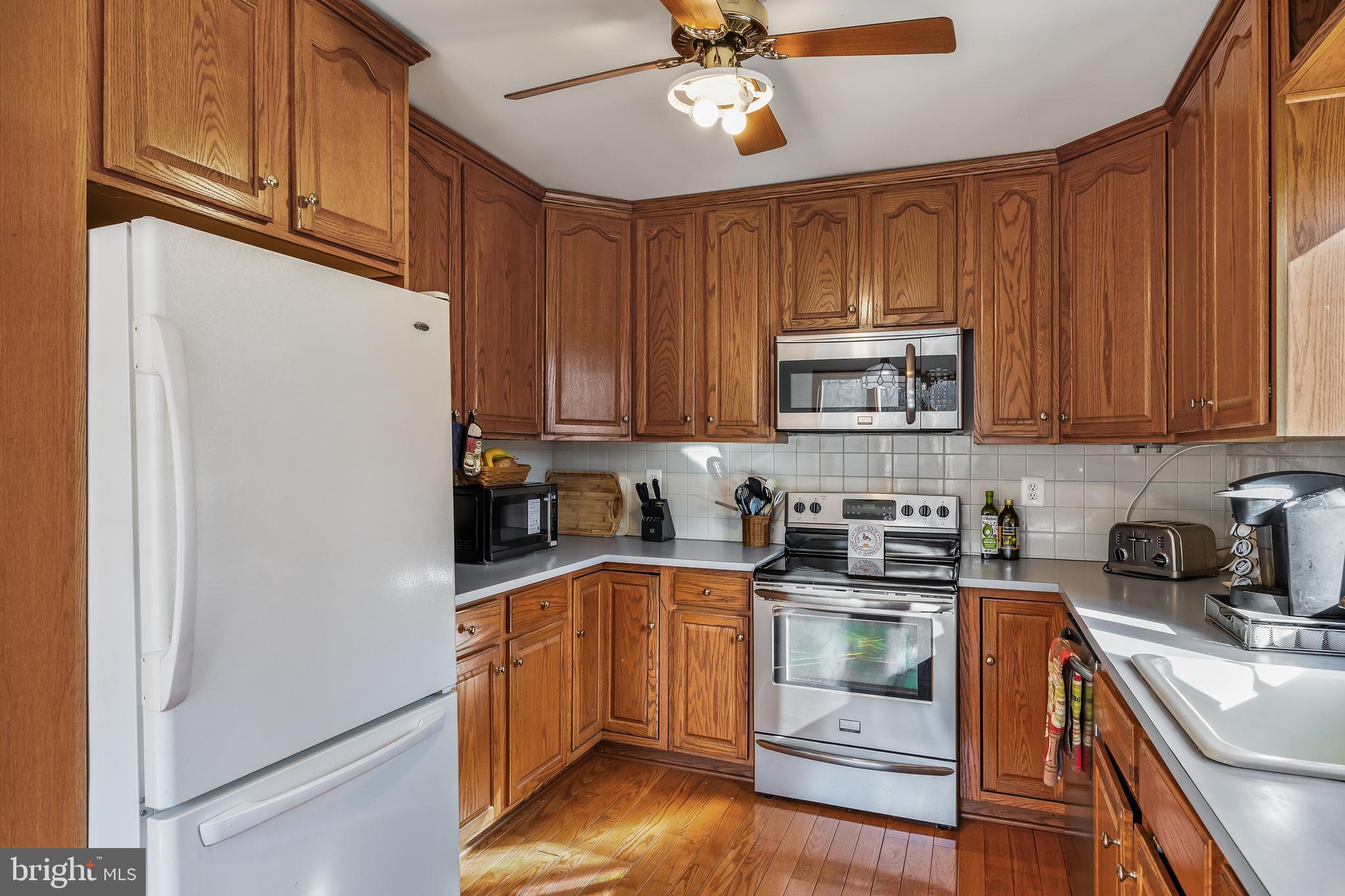 170 Birmingham Road Mount Holly, NJ 08060 - Photo 40 of 55 a kitchen with stainless steel appliances granite countertop a refrigerator and a stove top oven