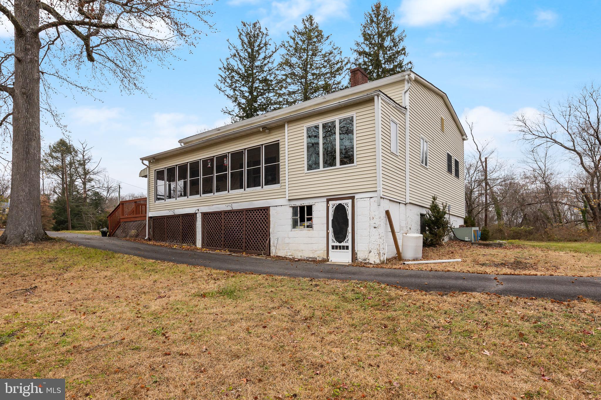 170 Birmingham Road Mount Holly, NJ 08060 - Photo 4 of 55 a view of a house with snow on the wall