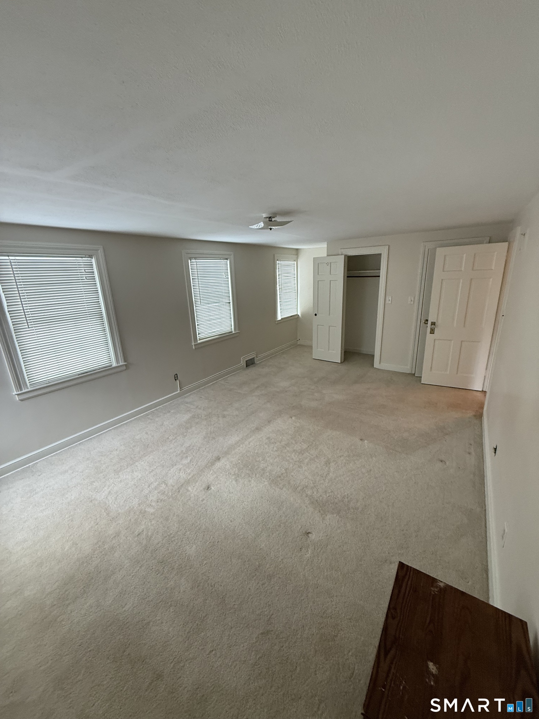 336 Ridgewood Road West Hartford, CT 06107 - Photo 16 of 21 an empty room with windows