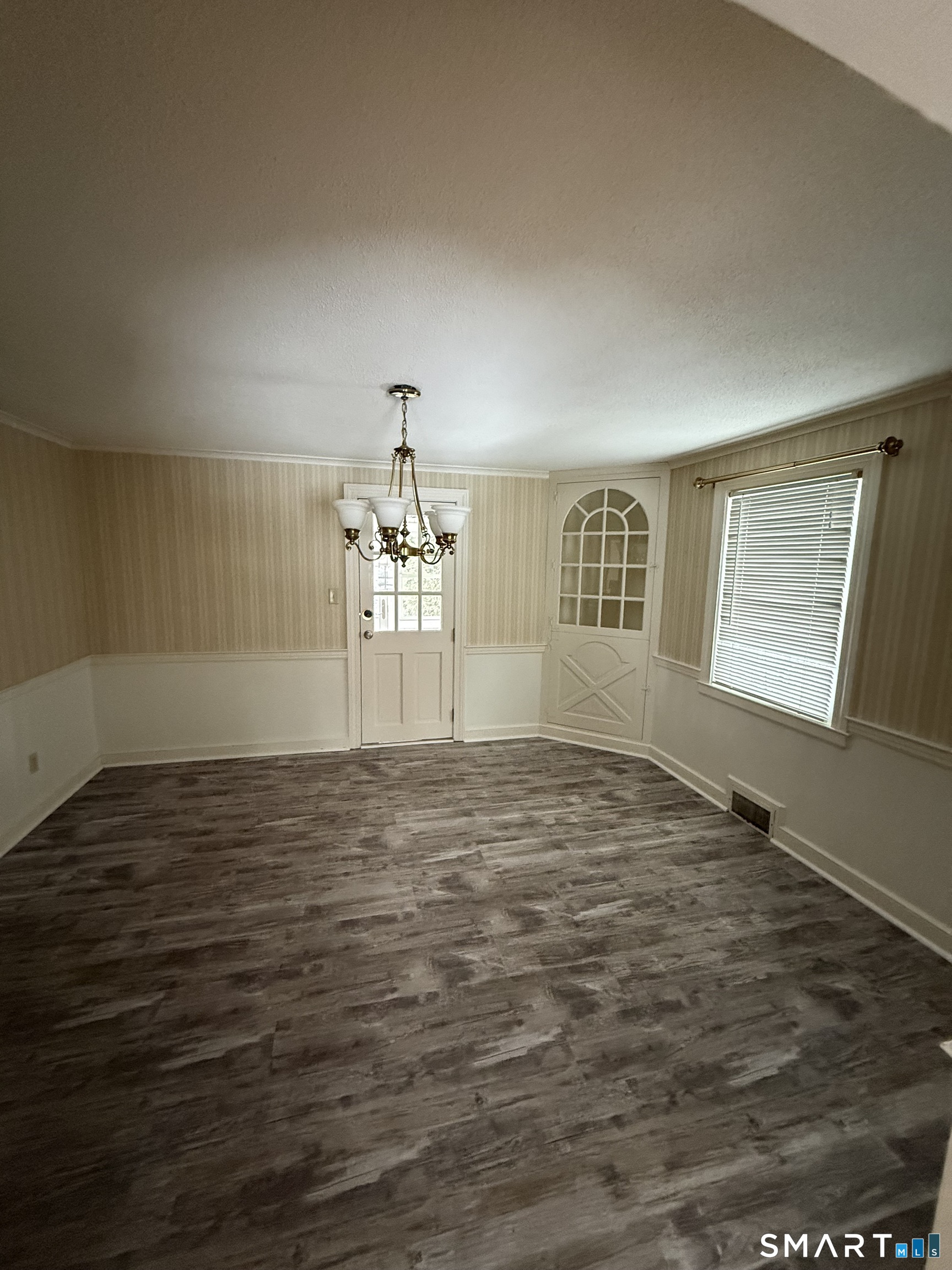 336 Ridgewood Road West Hartford, CT 06107 - Photo 4 of 21 a view of empty room with wooden floor