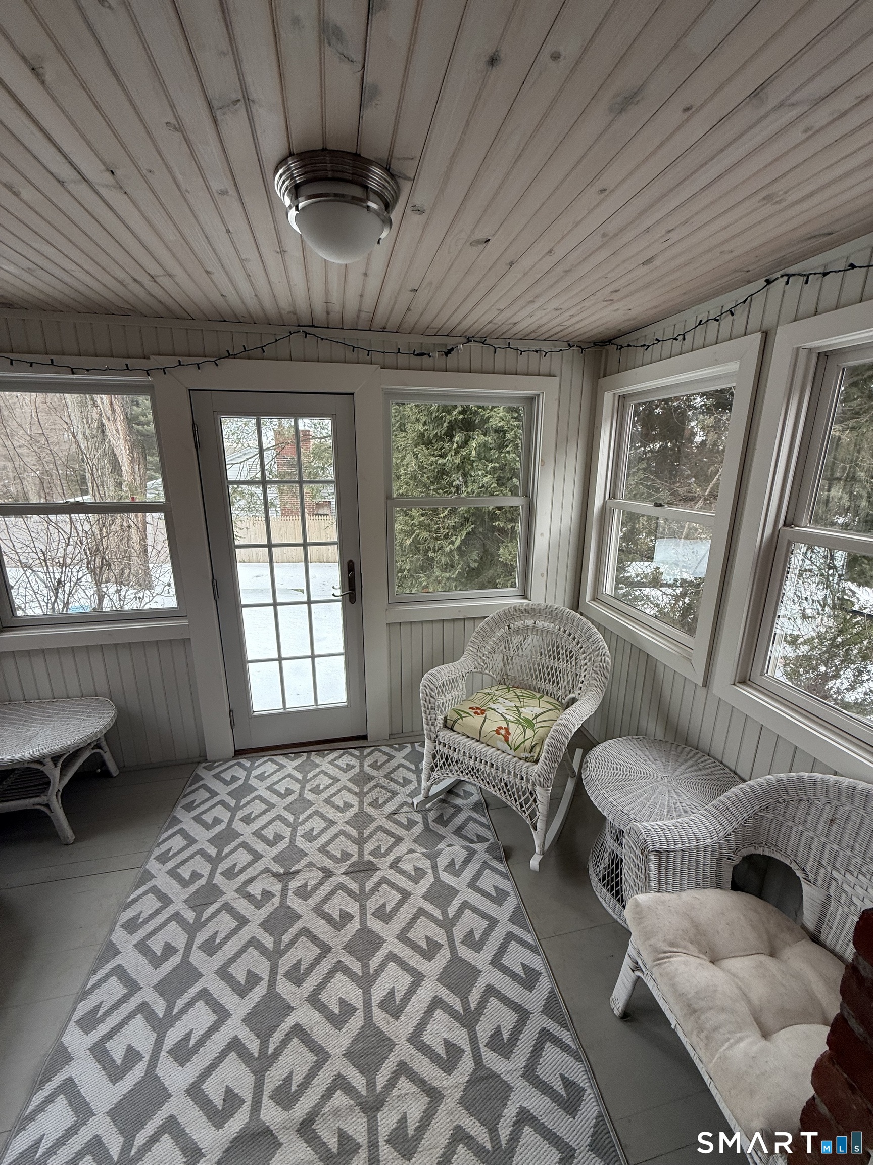 336 Ridgewood Road West Hartford, CT 06107 - Photo 8 of 21 a living room with furniture and a large window
