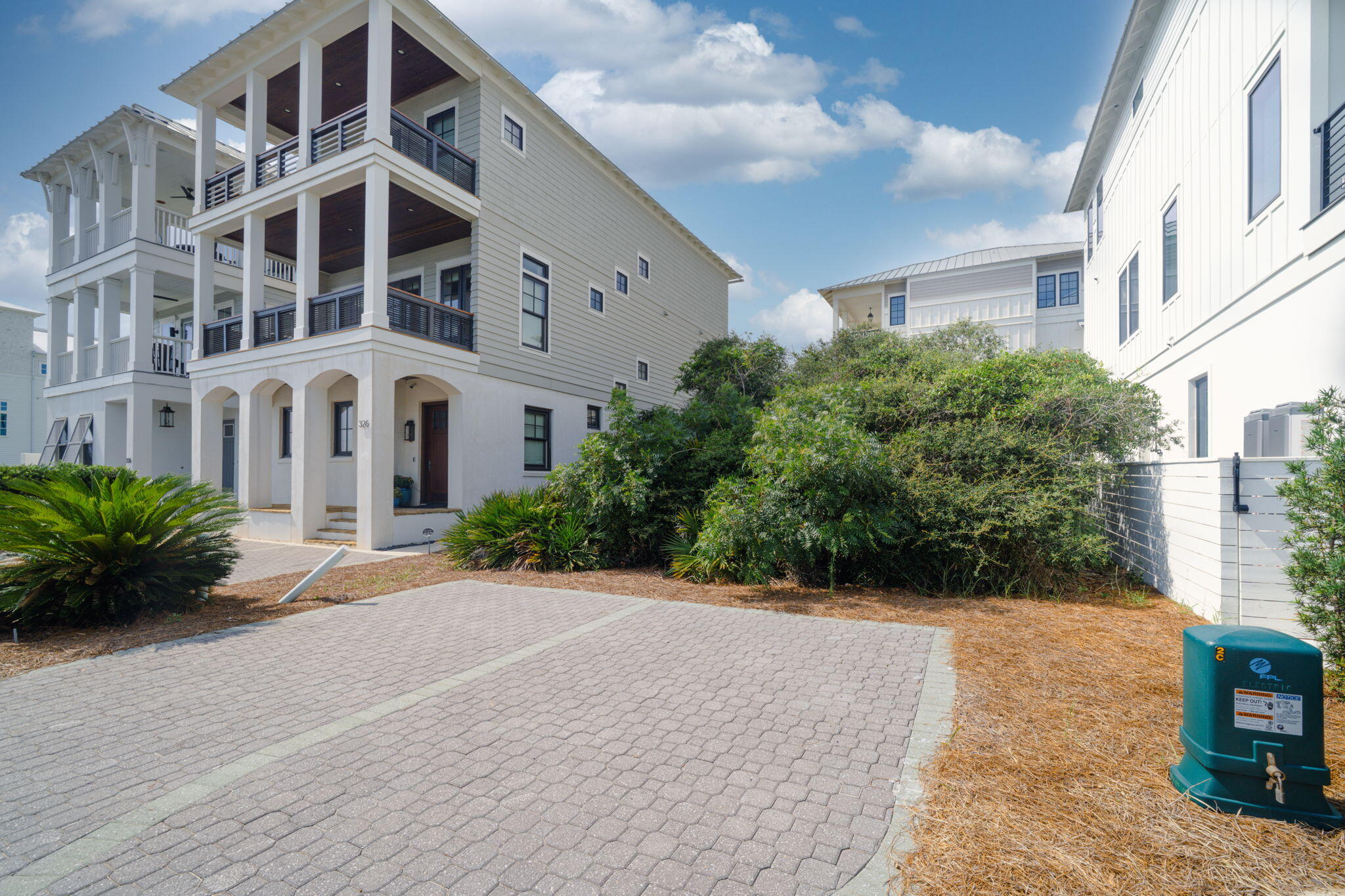 Lot 3 West Park Place Ave Inlet Beach Inlet Beach, FL 32461 - Photo 3 of 30 a view of a building with potted plants