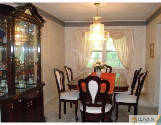 45 Lynnwood Road Edison, NJ 08820 - Photo 4 of 8 a dining room with furniture and window