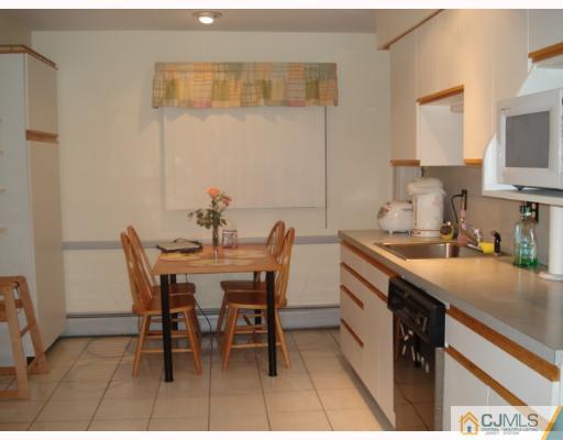 45 Lynnwood Road Edison, NJ 08820 - Photo 6 of 8 a view of a dining room with furniture